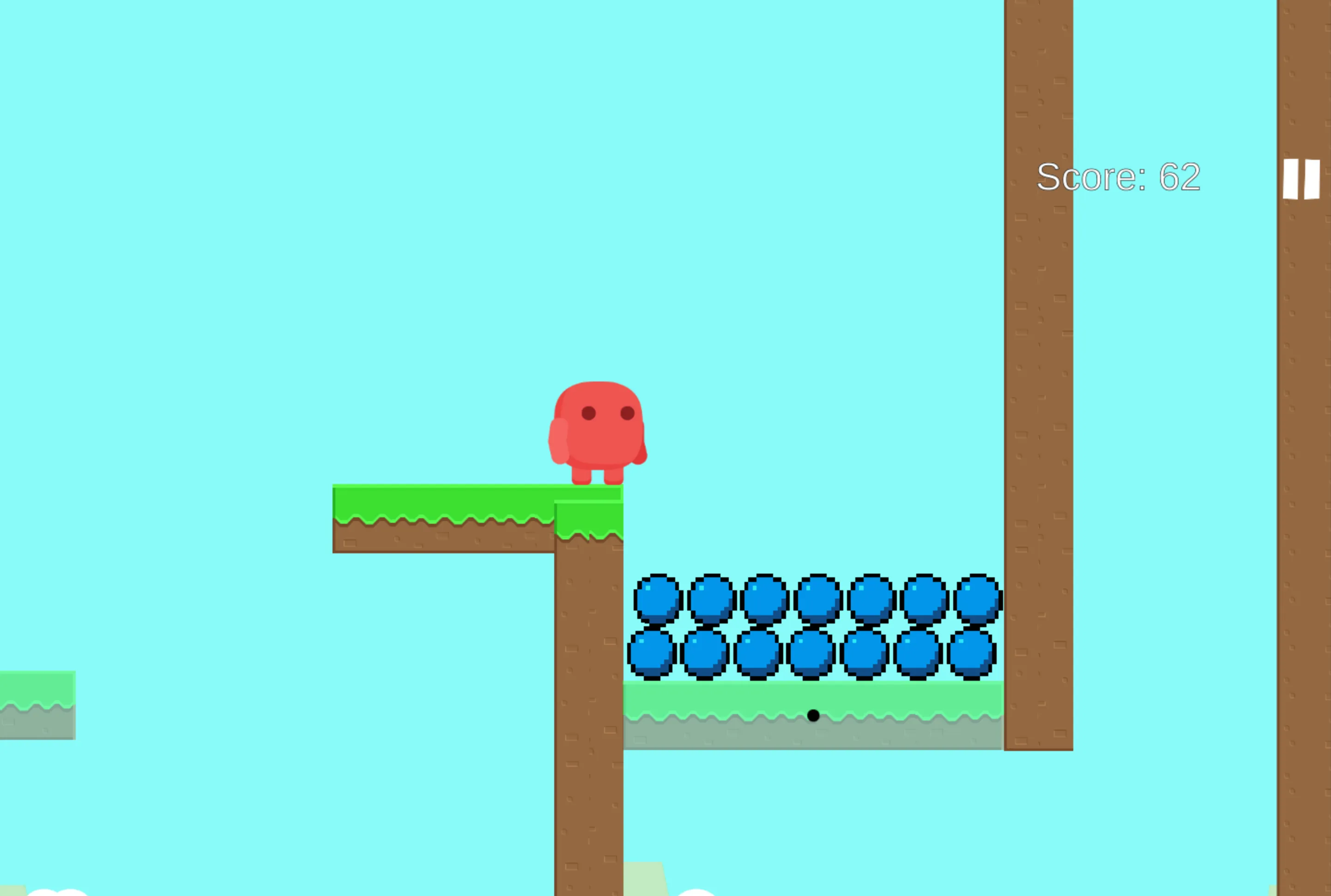 A red character stands on top of a tangible platforms surrounded by intangible ones